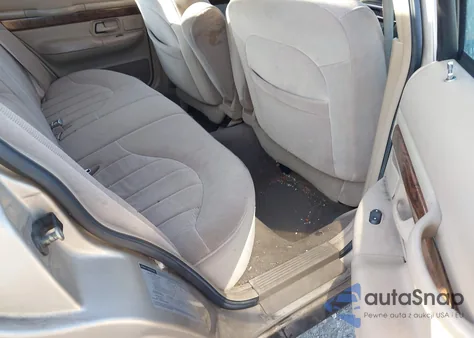 1999 Mercury Grand Marquis Gs из США, поврежденный, VIN 2MEFM74WXXX703928